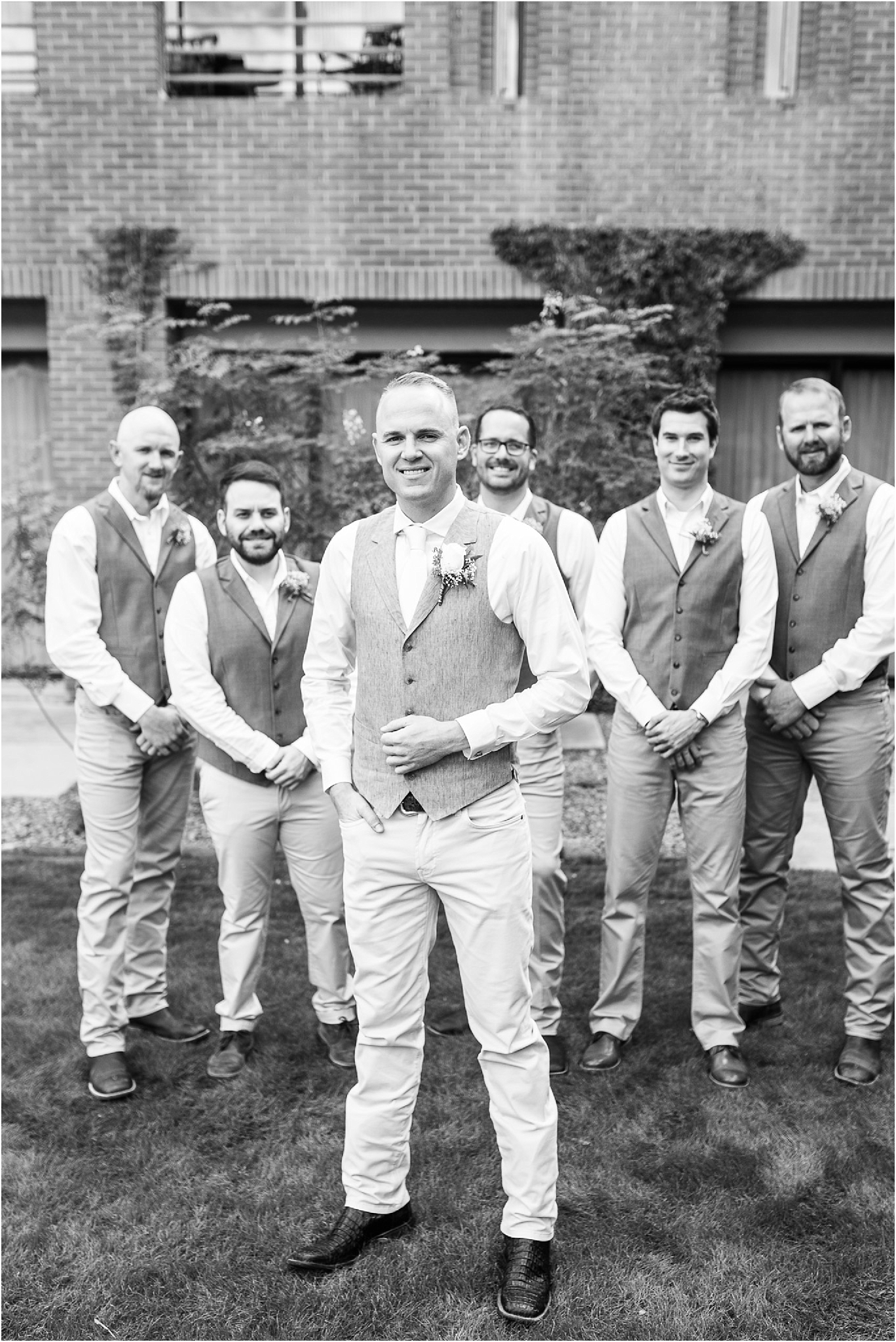The Lodge at Ventana Canyon black and white wedding photo of groom with groomsmen