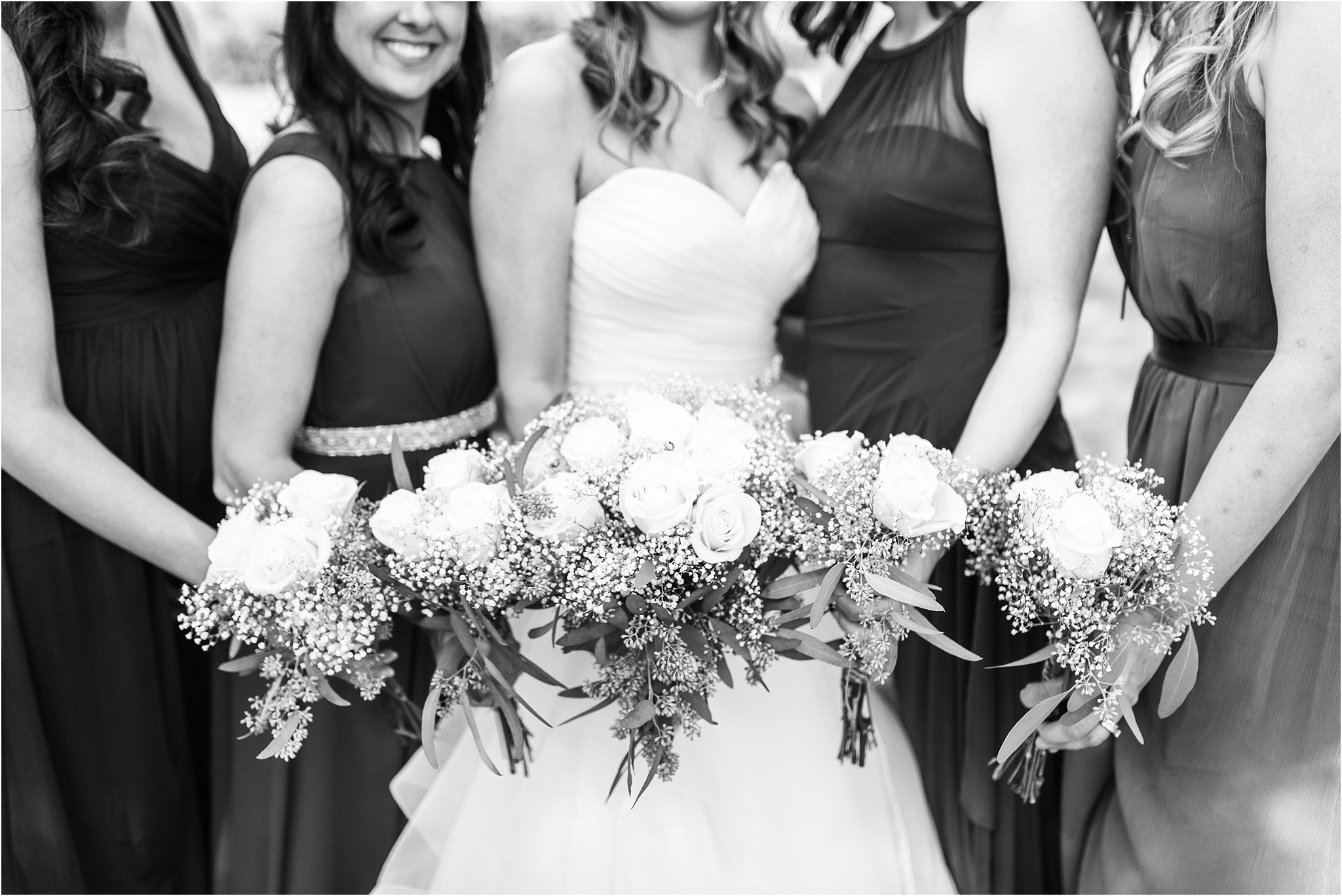 The Lodge at Ventana Canyon black and white wedding photo of bride and bridesmaids holding bouquets