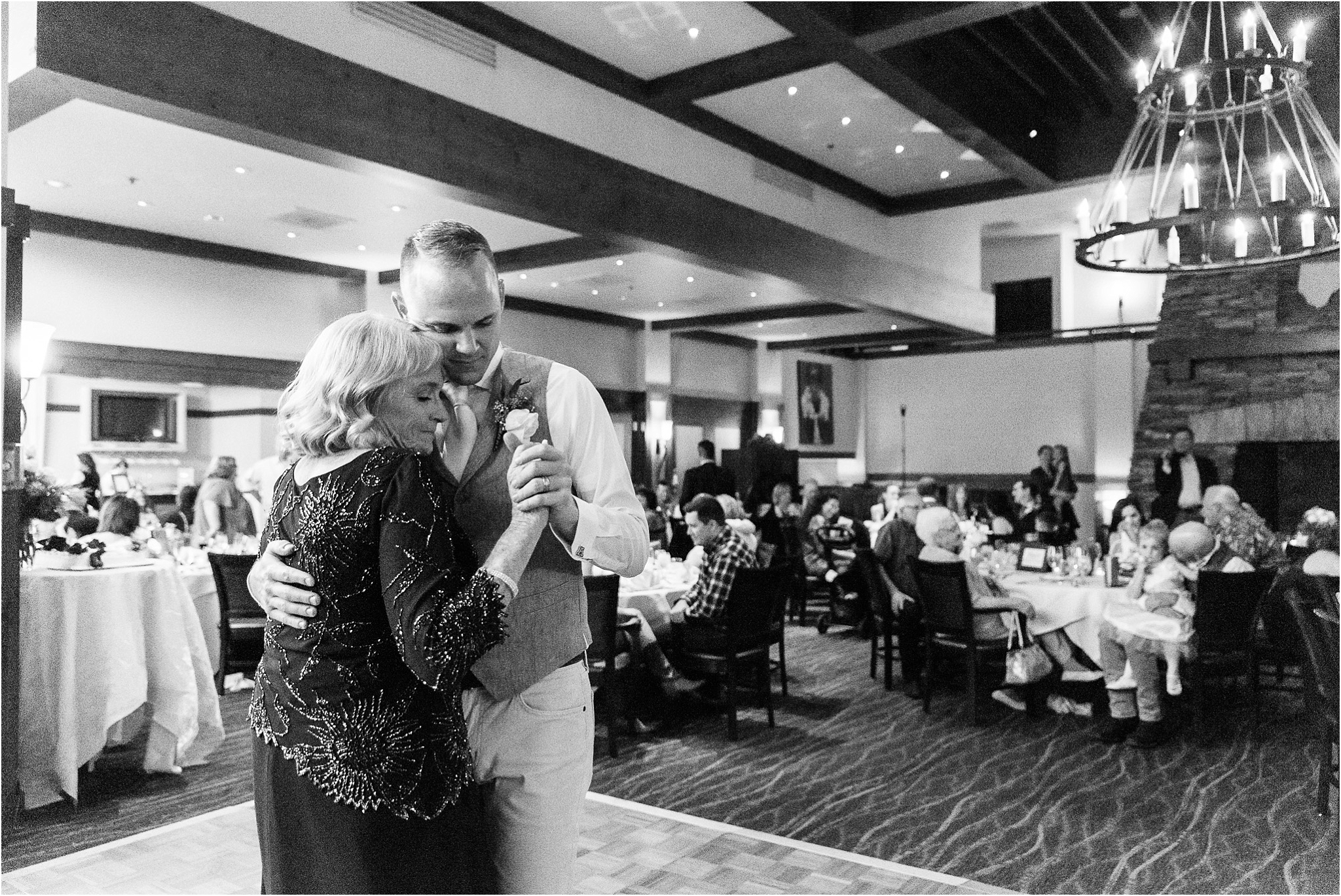 The Lodge at Ventana Canyon black and white wedding photo of groom and his mother dancing